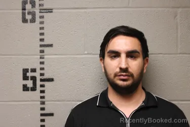 Mugshot of Ramin Moravedeh booked in Logan County, Oklahoma on September 14, 2026