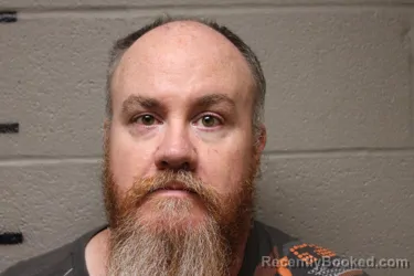 Mugshot of Jason Andrew Daniels booked in Logan County, Oklahoma on September 14, 2026