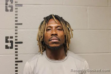 Mugshot of Devon Marquise Johnson booked in Logan County, Oklahoma on October 12, 2026