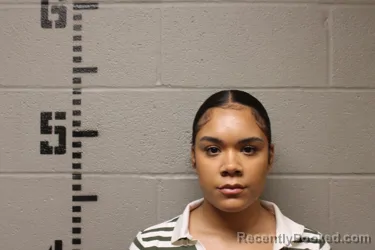 Mugshot of Zayna Calvert booked in Logan County, Oklahoma on October 13, 2026
