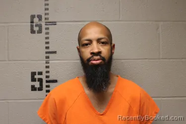 Mugshot of Blayne Jurrell Hinds booked in Logan County, Oklahoma on October 13, 2026
