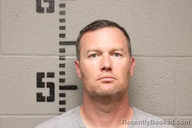 Mugshot of Charles Dennis Carson booked in Logan County, Oklahoma on October 13, 2026