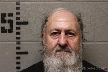 Mugshot of Johnny William Salyer booked in Logan County, Oklahoma on October 15, 2026
