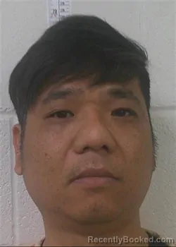 Mugshot of CAI BIN CHEN booked in Love County, Oklahoma on April 1, 2026