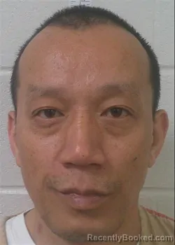 Mugshot of JIAN KAI HUANG booked in Love County, Oklahoma on April 2, 2026