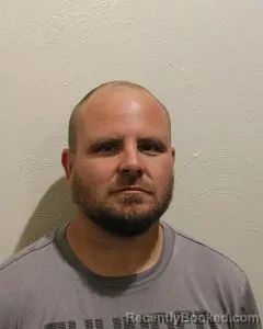 Mugshot of ROBERT LEE BALLENGER booked in McClain County, Oklahoma on March 22, 2026