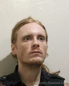 Mugshot of REMINGTON JAMES TYLER booked in McClain County, Oklahoma on March 26, 2026