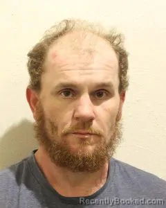 Mugshot of CHRISTOPHER LYN DENNIS booked in McClain County, Oklahoma on June 15, 2026