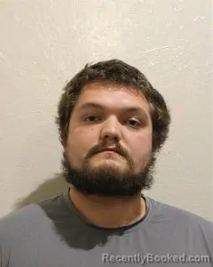 Mugshot of AUSTIN JACOB COLE booked in McClain County, Oklahoma on July 13, 2026