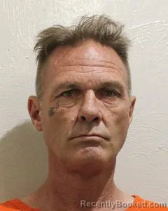 Mugshot of Raymond Muriel Junior. Brooks booked in McClain County, Oklahoma on August 21, 2026