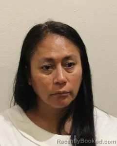Mugshot of Karina Estela Montes booked in McClain County, Oklahoma on August 27, 2026