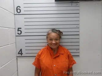 Mugshot of Lora L Hassell booked in Muskogee County, Oklahoma on August 21, 2026