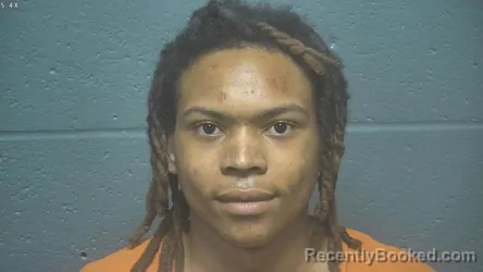 Mugshot of DOMINIK TATE booked in Oklahoma County, Oklahoma on March 31, 2026