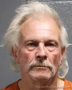 Mugshot of JOHNNY ALLEN MANOS booked in Oklahoma County, Oklahoma on March 30, 2026