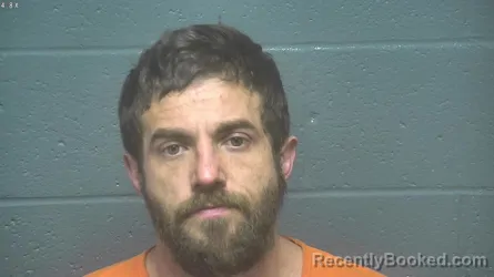 Mugshot of MICHAEL CODY MACOMBER