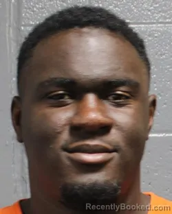 Mugshot of MAXWELL N SUH booked in Oklahoma County, Oklahoma on March 23, 2026