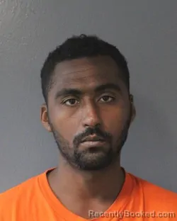 Mugshot of Nkosi Kishwa Mwalimu Ajanaku booked in Oklahoma County, Oklahoma on August 30, 2026