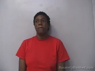 Mugshot of Elesha Deborah Booker booked in Okmulgee County, Oklahoma on March 30, 2026