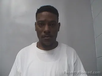 Mugshot of Laron Darnell Henry booked in Okmulgee County, Oklahoma on June 23, 2026