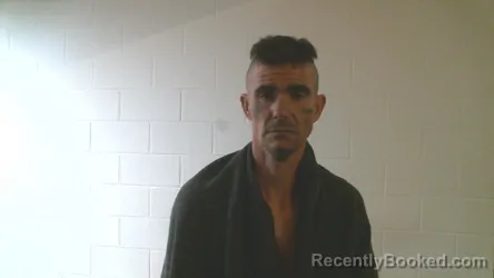 Mugshot of QUINTEN AUST booked in Ottawa County, Oklahoma on March 21, 2026