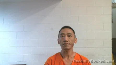 Mugshot of PING XIONG booked in Ottawa County, Oklahoma on April 22, 2026