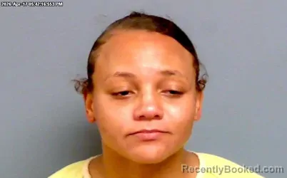 Mugshot of ASHANTI LANAE WHITE booked in Payne County, Oklahoma on April 17, 2026