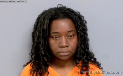 Mugshot of ANASTASIA BAMBO NELA booked in Payne County, Oklahoma on April 24, 2026