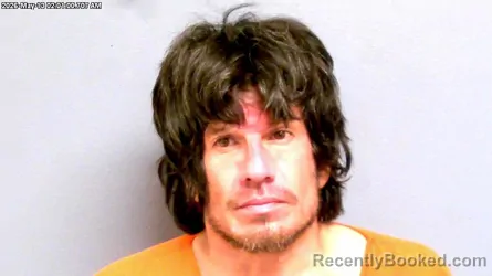 Mugshot of JESSE MICHAEL ROBBINS booked in Payne County, Oklahoma on May 13, 2026