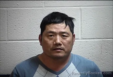 Mugshot of ZHONGXIONG YANG booked in Pottawatomie County, Oklahoma on May 6, 2026