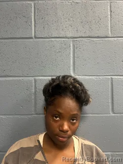 Mugshot of NICOLE LASHAWN CADAMY booked in Rogers County, Oklahoma on March 30, 2026