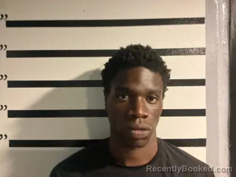 Mugshot of DIVIN KAPINGA booked in Sequoyah County, Oklahoma on March 25, 2026