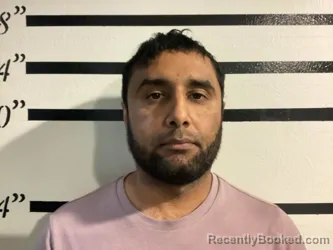 Mugshot of RAMIZBEK ABDURAKHMONOV booked in Sequoyah County, Oklahoma on May 11, 2026