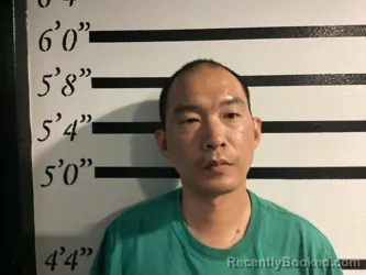Mugshot of GUANYU ZHANG booked in Sequoyah County, Oklahoma on May 12, 2026