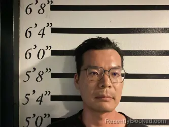 Mugshot of FAN LI booked in Sequoyah County, Oklahoma on May 23, 2026