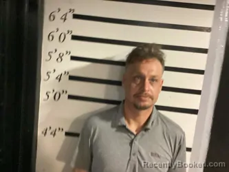 Mugshot of Kevin Lee Reed booked in Sequoyah County, Oklahoma on August 7, 2026