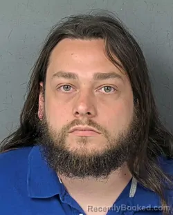 Mugshot of MATTHEW AARON CUESTA