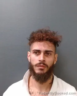 Mugshot of ALEXANDER JUSTINIANO MARTINEZ