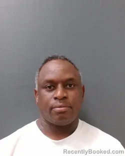 Mugshot of ERIC WAINANIA KIRAGU booked in Comal County, Texas on April 26, 2026