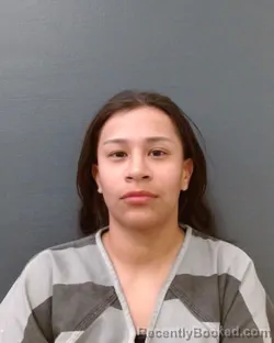 Mugshot of BRITNEY DANIEL FLORES booked in Comal County, Texas on May 2, 2026