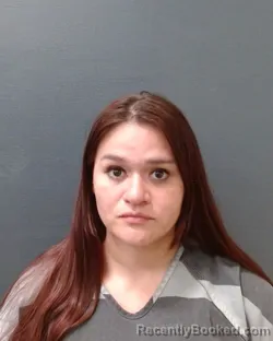 Mugshot of Roxanne Arispe booked in Comal County, Texas on August 4, 2026