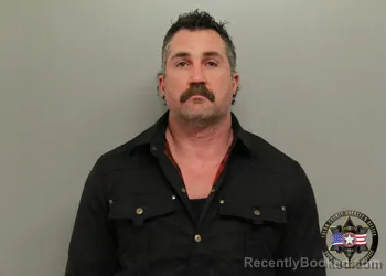 Mugshot of JONATHAN M TIMMONS