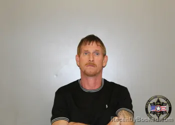 Mugshot of JAMES OZBUN