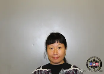 Mugshot of XIAOYIN HUANG AGENT