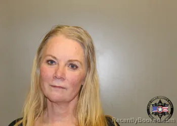 Mugshot of KIMBERLY ANN REED booked in Tulsa County, Oklahoma on March 7, 2026