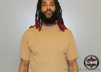 Mugshot of ENRIQUE DANTE DAVIS booked in Tulsa County, Oklahoma on March 12, 2026