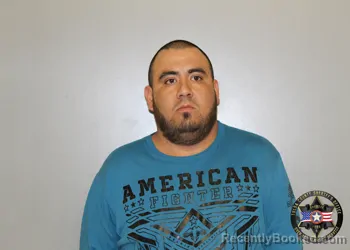 Mugshot of CARLOS ALFREDO VALDIVIA CASIQUE booked in Tulsa County, Oklahoma on March 13, 2026