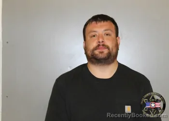 Mugshot of AUSTIN LAYNE MUNS booked in Tulsa County, Oklahoma on March 22, 2026