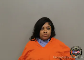 Mugshot of ALEXUS BREON SHANTE CARTER booked in Tulsa County, Oklahoma on March 23, 2026
