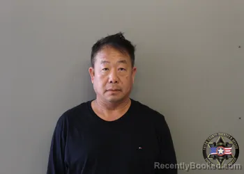 Mugshot of ADAM KUE booked in Tulsa County, Oklahoma on March 31, 2026