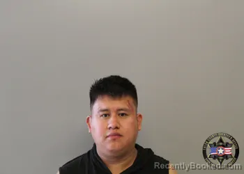 Mugshot of SANTIAGO FREDY CANSECO-CRUZ booked in Tulsa County, Oklahoma on April 25, 2026